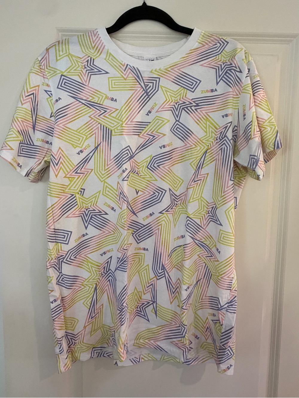 Zumba Fitness White Tee with Yellow, Blue & Pink Starburst Print
